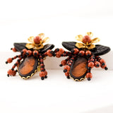 Brown statement earrings