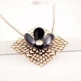 Black enamel flower necklace with vintage brass filigree