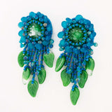 Teal green beaded statement earrings with vintage cabochon