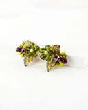Vintage style hand beaded green flower clip on earrings