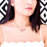 Antique style necklace with pink enamel flower and brass leaves