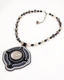 Gray statement necklace