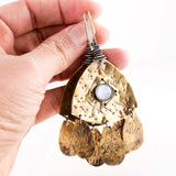 Mixed metal hammered earrings with light blue stone