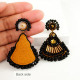 Black gold statement dangle earrings