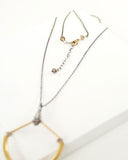 Turquoise mixed metal necklace with brass and silver