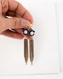 Gold tassel earrings with hand painted blue flower