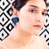 Big stud earrings