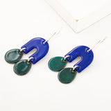 Indigo blue and dark green arch drop earrings