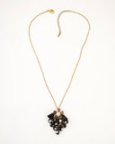 Vintage style black beaded necklace | Antique floral pendant