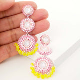 Pink and yellow statement earrings