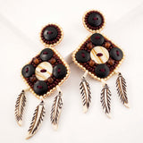 Tribal inspired bone and horn bead statement earrings