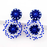 White & blue hand beaded statement earrings