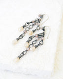 Silver dangle earrings with ivory and blush quartz
