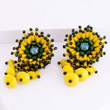 yellow dangle earrings
