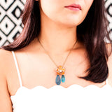 Burnt orange teal green enamel pendant necklace