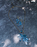 Leaf lariat necklace with blue stone