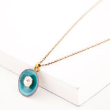 Sea blue enamel disc pendant necklace with clear crystal