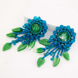 Green statement earrings