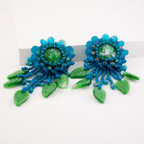 Teal green beaded statement earrings with vintage cabochon