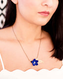 Royal blue enamel flower & antique brass leaves necklace