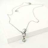 dainty silver wire wrapped necklace