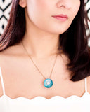 Turquoise statement necklace with enamel flower & brass chain