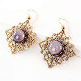 Big purple earrings
