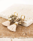 White tassel earrings with vintage floral brass