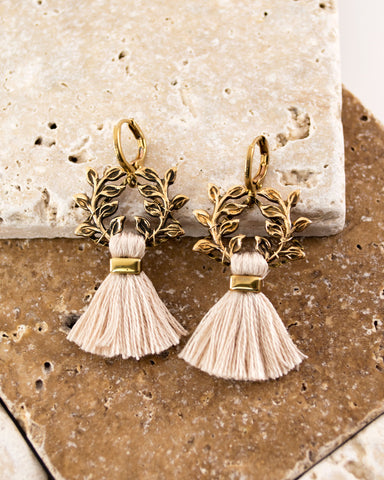 White tassel earrings with vintage floral brass
