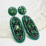 Emerald green statement dangle earrings